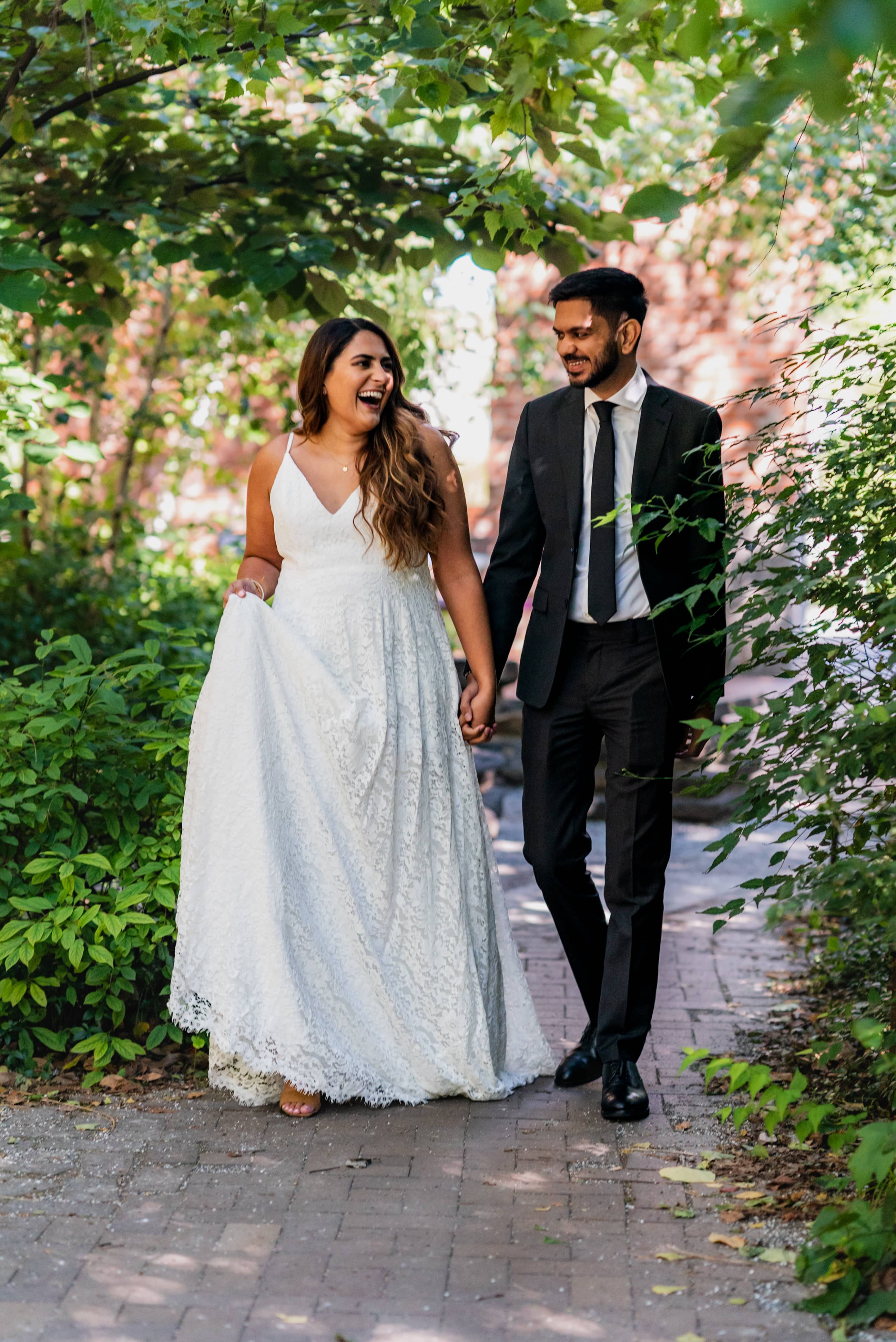 Engaged couple posing in soft natural light